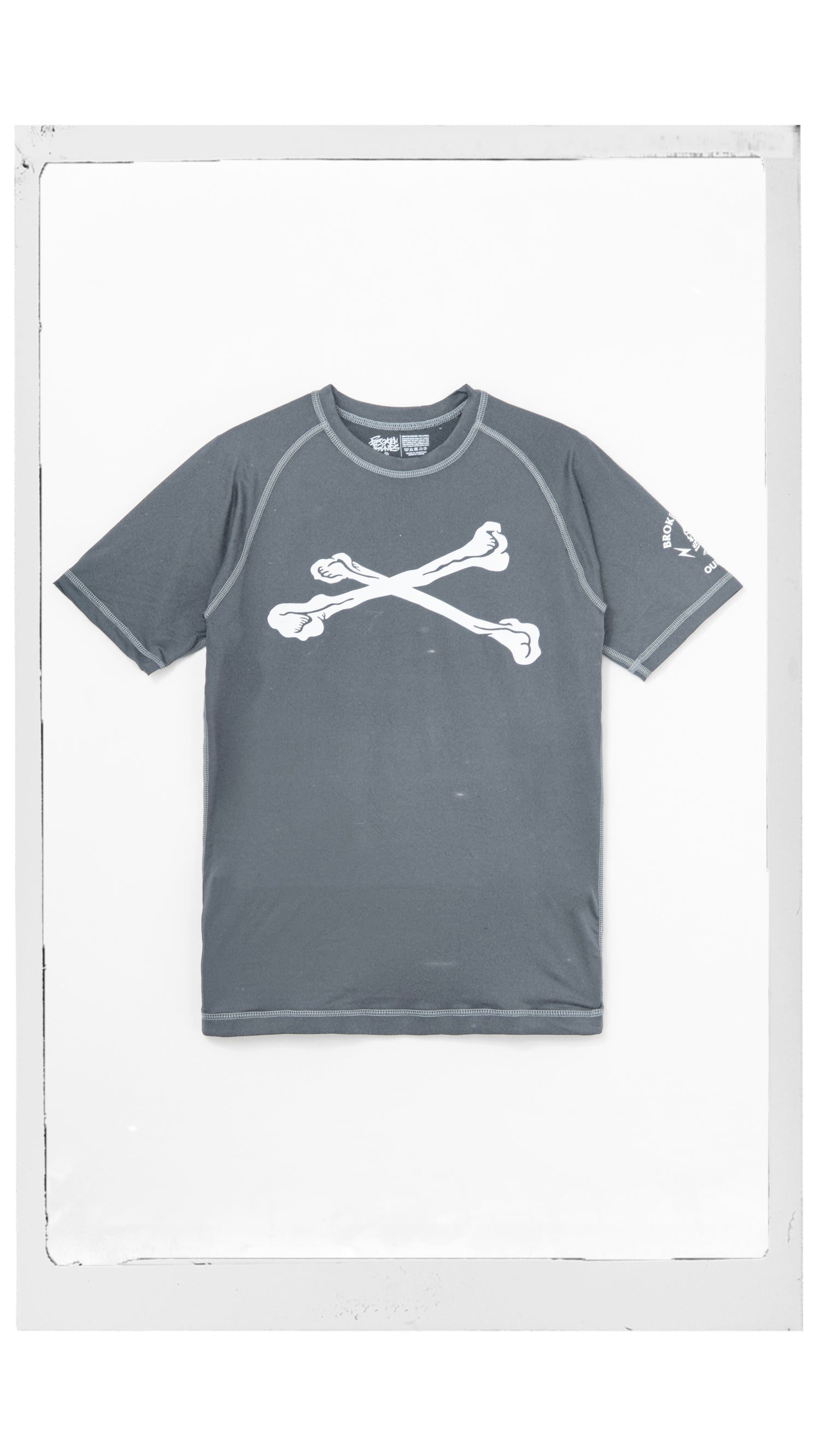 Gray t-shirt with white graphic design on a white background